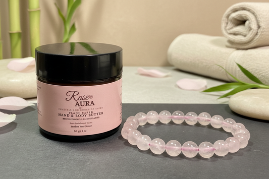 Rose Aura hand cream and bracelet with spa background